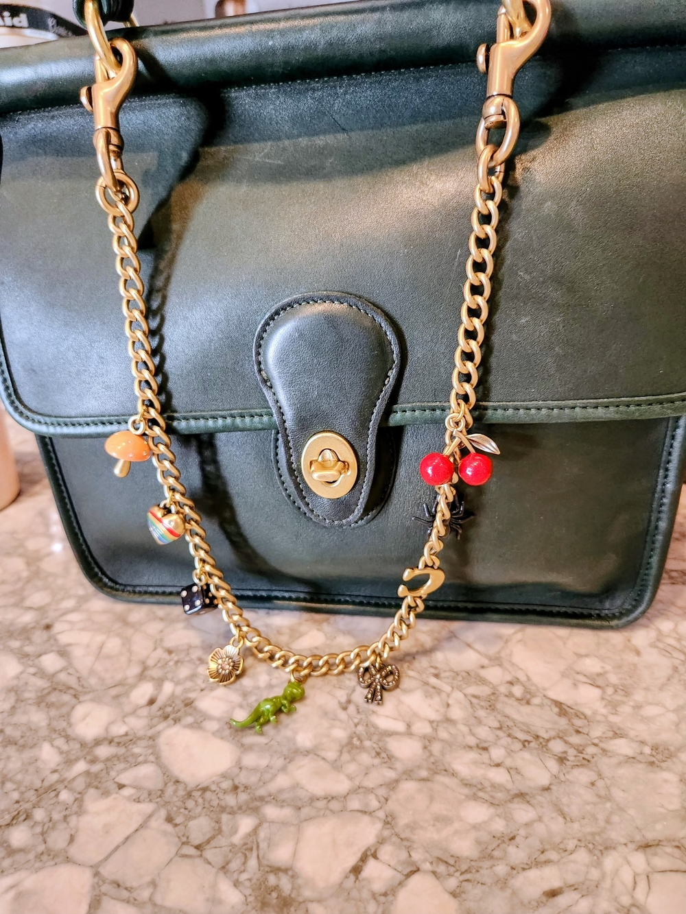 Coach Gold-Tone Charm Bracelet with Red Cherry and Black Spider Accents - Picture 4 of 5